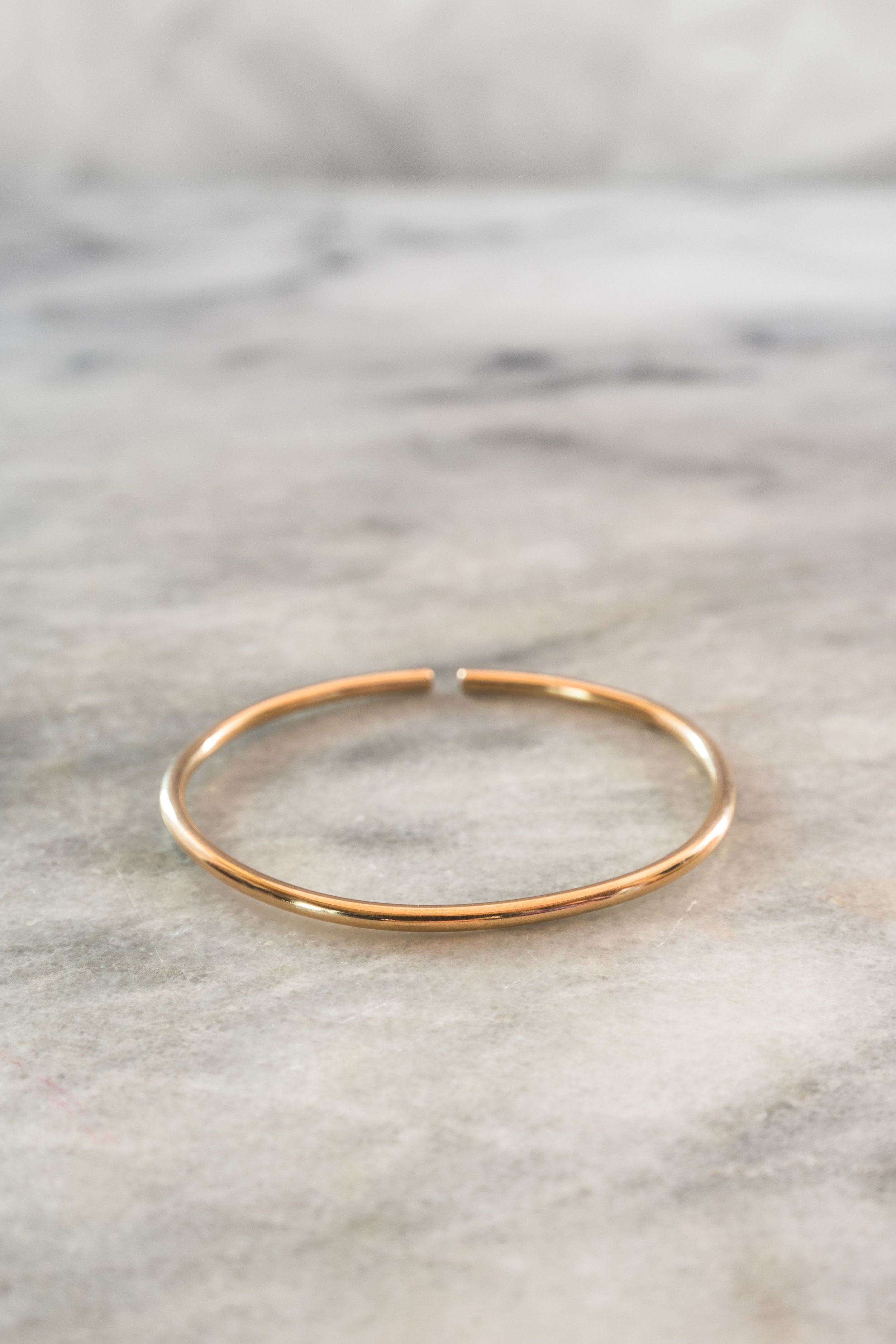 MJ+Bangle-+Gold.jpg?format=1000w